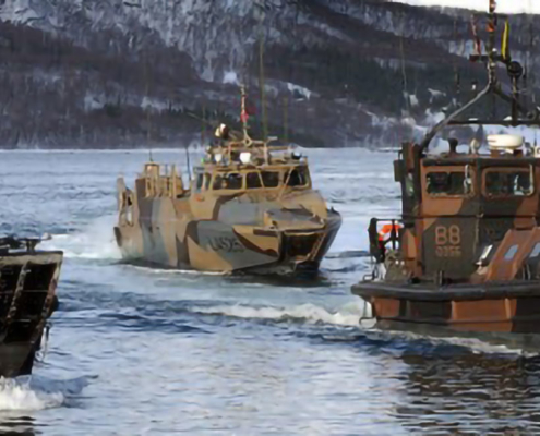 An image of amphibious vehicles on the sea
